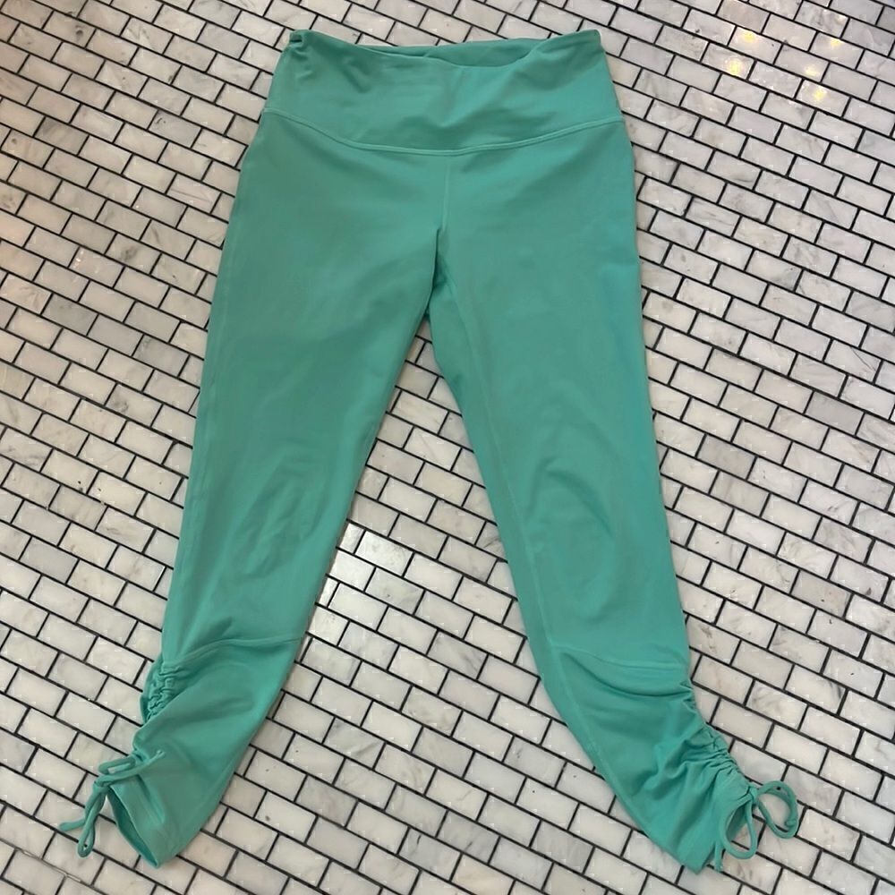 Zella green yoga pants with cinch ties at ankles. Have matching athletic bra